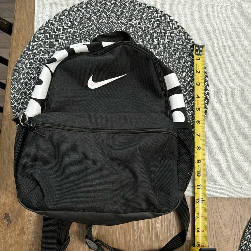 Nike black mini backpack.